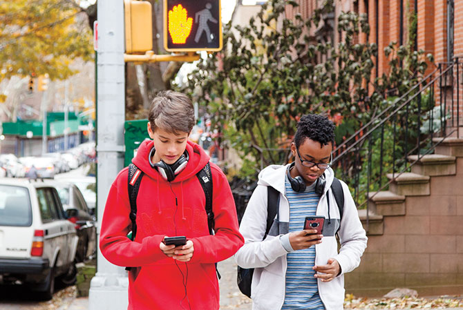 Should Texting While Walking Be Illegal?